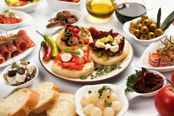 Table full of mediterranean appetizers, tapas or antipasto