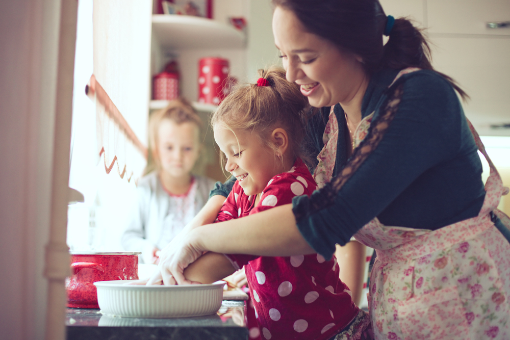 Mother and daughter baking
