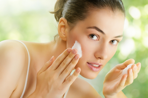Woman washing face