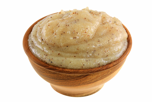 Sugar scrub in wooden bowl
