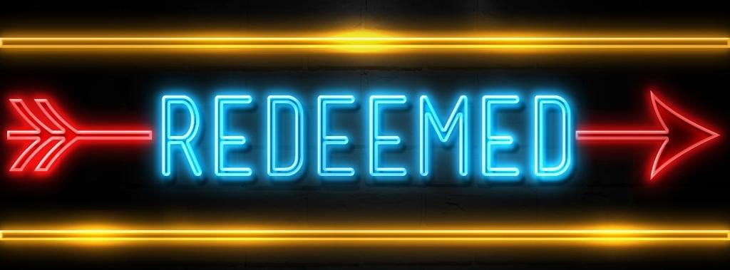 The word "Redeemed" in neon blue font with a red arrow and two yellow lines on black background.